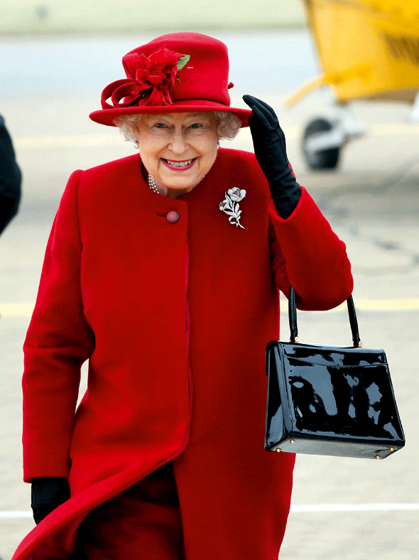 What does the Queen carry in her handbag?